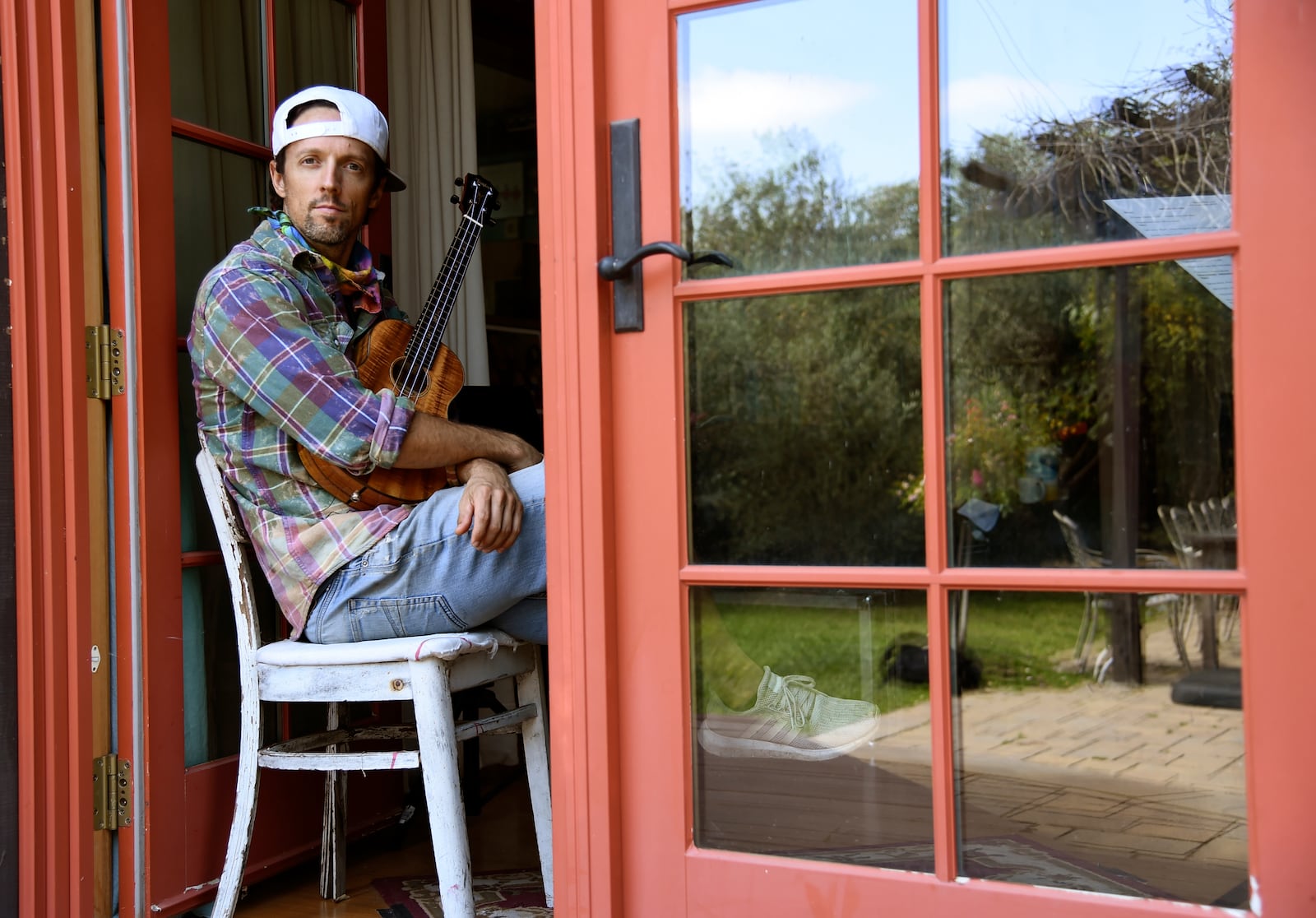 In this June 16, 2020 photo, singer-songwriter Jason Mraz poses for a portrait at his home in Oceanside, California. (AP Photo/Chris Pizzello)