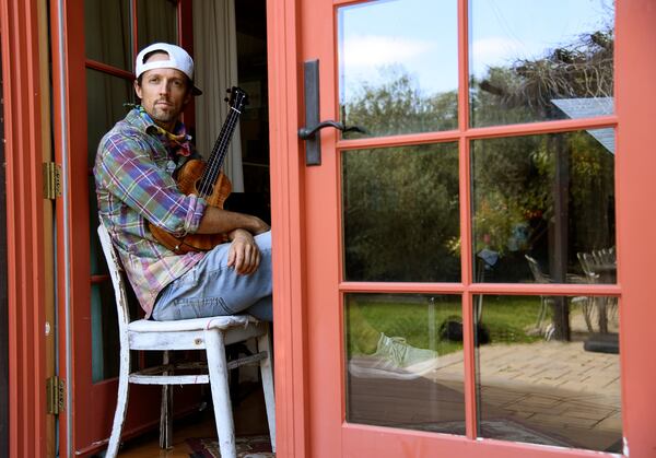 In this June 16, 2020 photo, singer-songwriter Jason Mraz poses for a portrait at his home in Oceanside, California. (AP Photo/Chris Pizzello)