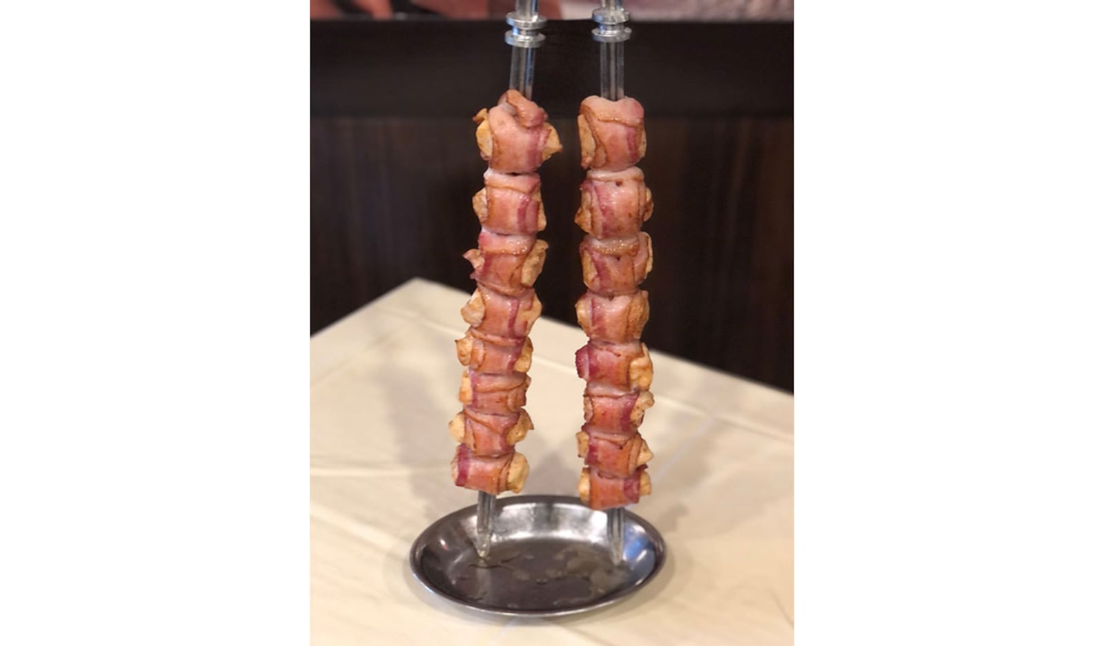 Frango (bacon-wrapped chicken) is on the menu at Passador Brazilian Steakhouse. Courtesy of Passador Brazilian Steakhouse