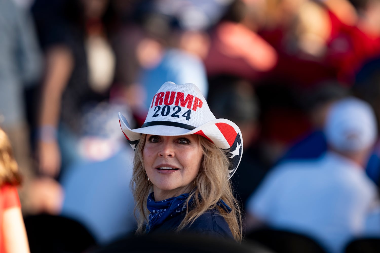 Kristy Graham of Macon looks for her dad before a rally for former President Donald Trump in Macon on Sunday, Nov. 3, 2024.   Ben Gray for the Atlanta Journal-Constitution