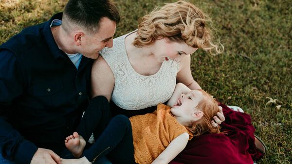 Staff Sgt. Andrew Smith, Andrea Smith and their daughter Charlotte.