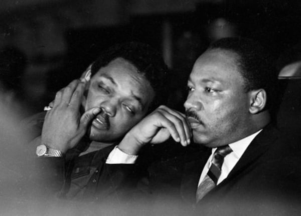 Dr. Martin Luther King, Jr. is seen here with Rev. Jesse Jackson, left, just prior to his final public appearance to address striking Memphis sanitation workers on April 4, 1968. King was assassinated later that day outside his motel room.