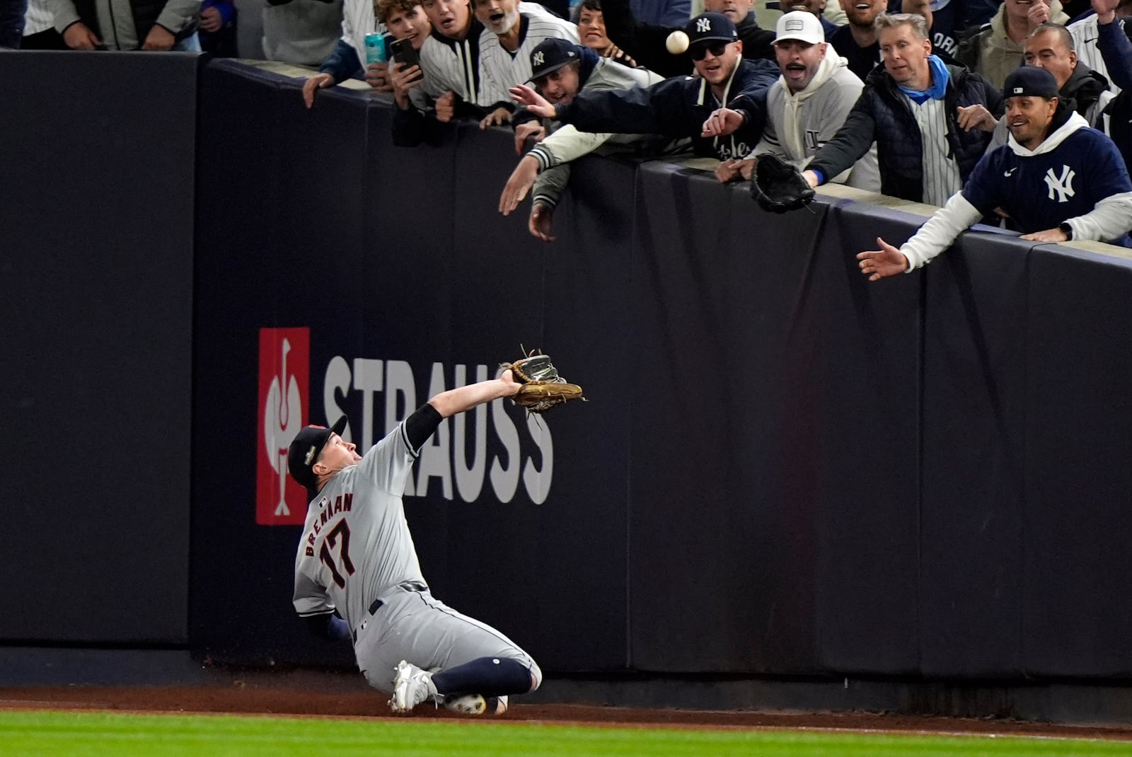 Cleveland Guardians right fielder Will Brennan catches a fly ball by New York Yankees' Giancarlo Stanton during the first inning in Game 2 of the baseball AL Championship Series Tuesday, Oct. 15, 2024, in New York. (AP Photo/Frank Franklin II)