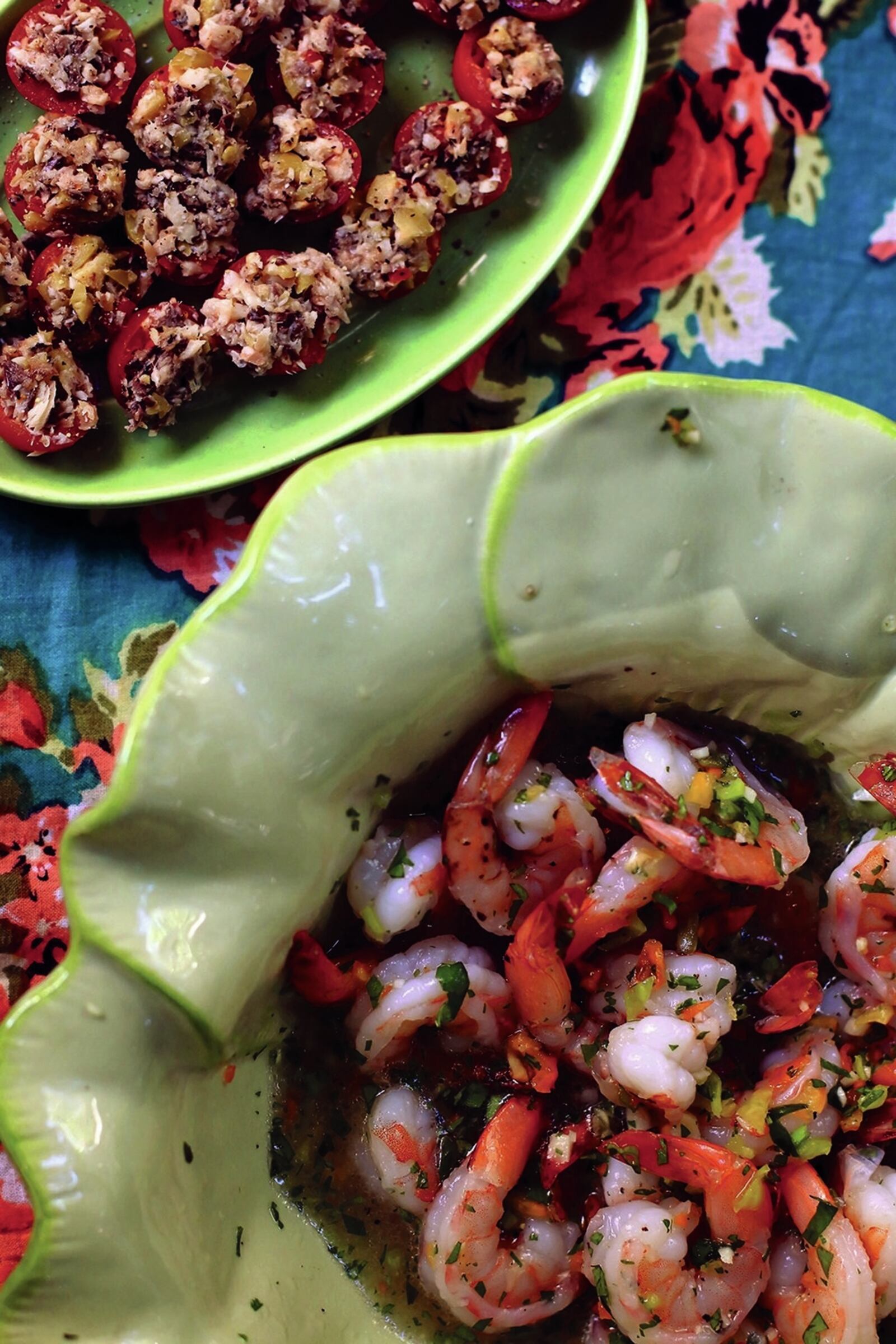 Cherry tomatoes stuffed with sardines and anchovies, and shrimp in citrus vinaigrette, from “Coconuts & Collards.” Photo: Cybelle Codish