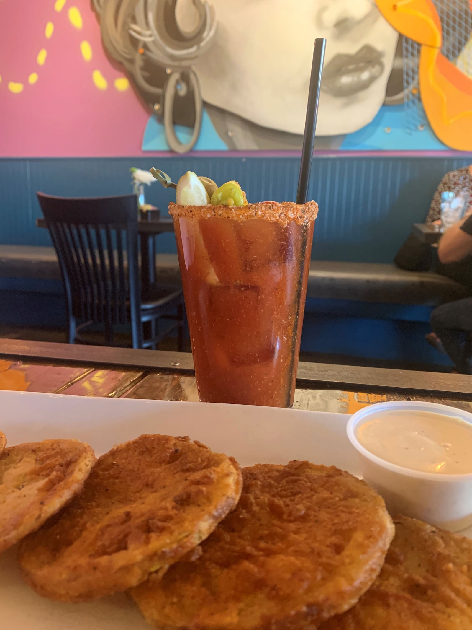 Fried green tomatoes with buttermilk ranch and a Betty Draper cocktail are recommended brunch offerings  at Hot Betty's. Angela Hansberger for The Atlanta-Journal Constitution