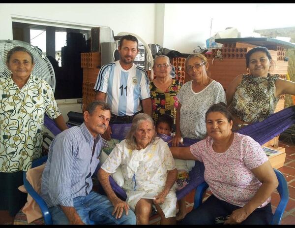 Rosa Carvajal (center) was a single mother supporting 12 children in Venezuela by making cheese, empanadas and arepas, which she sold to the neighbors. 
Courtesy of Mrs. Rosa Foods