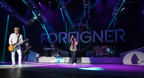 The British-American rock band Foreigner with founder and lead guitarist Mick Jones, from left, guitarist Bruce Watson, keyboardist Michael Bluestein, lead vocalist Kelly Hansen and drummer Chris Frazier performs at the Blue Hills Bank Pavilion as part of The Juke Box Heroes Tour, Wednesday, June 20, 2018, in Boston. (Photo by Robert E. Klein/Invision/AP)