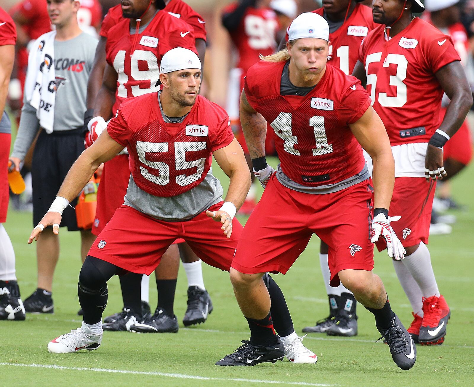 081915 FLOWERY BRANCH: Falcons linebacker Paul Worrilow (left) and outside linebacker Tyler Starr (right) run a defensive drill during team practice on Wednesday, August 19, 2015, in Flowery Branch. Curtis Compton / ccompton@ajc.com