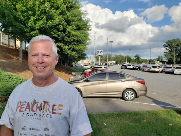 Chris Lenyszyn said he avoids wearing masks in public unless it is required to enter a business or medical office. He was recently at a Kroger store in Cobb County where masks are encouraged but not required. Lenyszyn said he doesn’t believe reports about recent increases in the number of confirmed COVID-19 cases and thinks people will rebel against any government mandates to wear masks in public. MATT KEMPNER / AJC