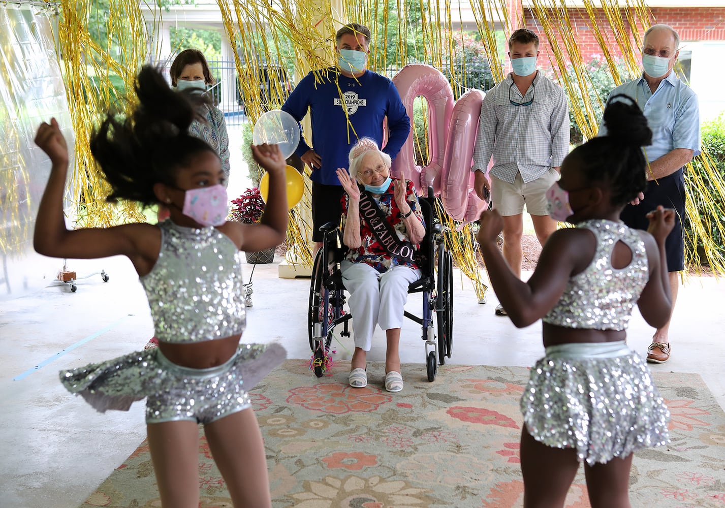 Photos: COVID-19 survivor celebrates 100th birthday