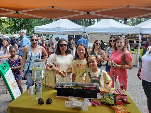 Fans of Love Guac line up at the Saturday morning Peachtree City Farmers Market to sample their four flavors and decide on a favorite. CONTRIBUTED BY LOVE GUAC