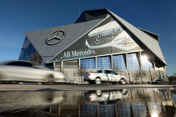 Mercedes-Benz Stadium will play host to College Football Playoff National Championship in 2025 and FIFA World Cup events in 2026. The midyear spending plan that budget writers in the state Senate approved Tuesday includes $29.25 million for public safety and infrastructure costs related to those events. (Jason Getz / Jason.Getz@ajc.com)