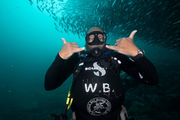 Frank Ski photographed under water while diving during one of his foundation's annual environmental education tours.