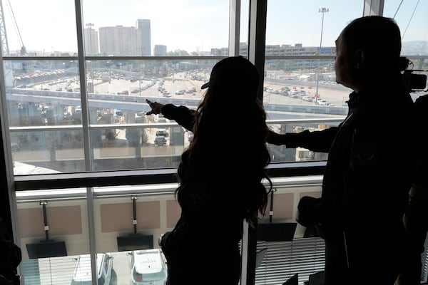 Homeland Security Secretary Kristi Noem, left, tours the San Ysidro Port of Entry, Sunday, March 16, 2025, in San Diego. (AP Photo/Alex Brandon)