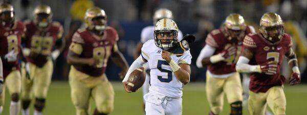 October 24, 2015 Atlanta: Georgia Tech Yellow Jackets quarterback Justin Thomas in route to a touchdown late in the first half against the Florida State Seminoles Saturday October 24, 2015. BRANT SANDERLIN/BSANDERLIN@AJC.COM