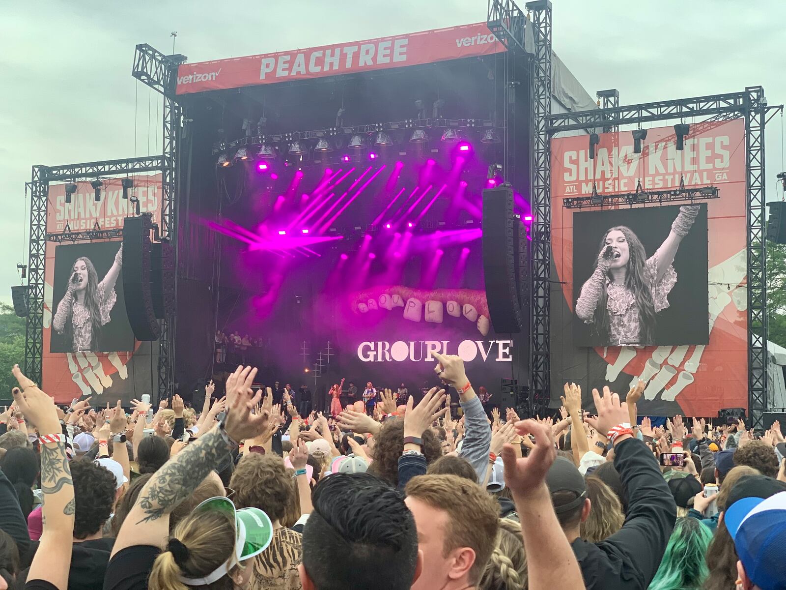 Fans raise their hands and sing along with Grouplove on Friday, May 5, 2023, at Shaky Knees music festival. (Taylor Croft/taylor.croft@ajc.com)