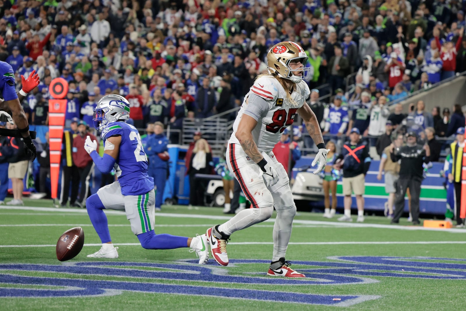 San Francisco 49ers tight end George Kittle reacts after scoring during the second half of an NFL football game against the Seattle SeahawksThursday, Oct. 10, 2024, in Seattle. (AP Photo/John Froschauer)