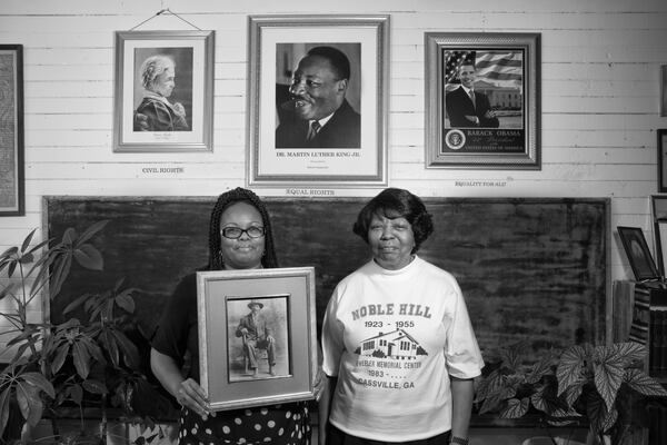 Valerie Coleman (left) and Marian Coleman hold a photo of their ancestor Webster Wheeler, who migrated to Detroit, but returned to Cassville, Ga., to help build the Noble Hill School. That school is now a cultural heritage and community center, curated by Valerie Coleman, great-great-great granddaughter of Wheeler. Valerie's aunt, Marian Coleman, is one of the last graduates of Noble Hill. The two are part of the effort to create a National Park unit dedicated to the Rosenwald schools. Photo: Andrew Feiler