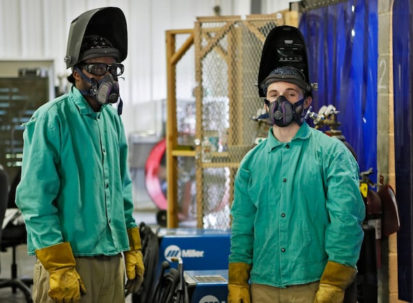 July 10, 2019, 2019 -  Lawrenceville -  Gage Bryant (right) and Christopher Wilson in the welding classroom at the at the Gwinnett County Comprehensive Correctional Complex in Lawrenceville, where they are incarcerated.   The facility offered them the opportunity to learn welding.  Bob Andres / bandres@ajc.com