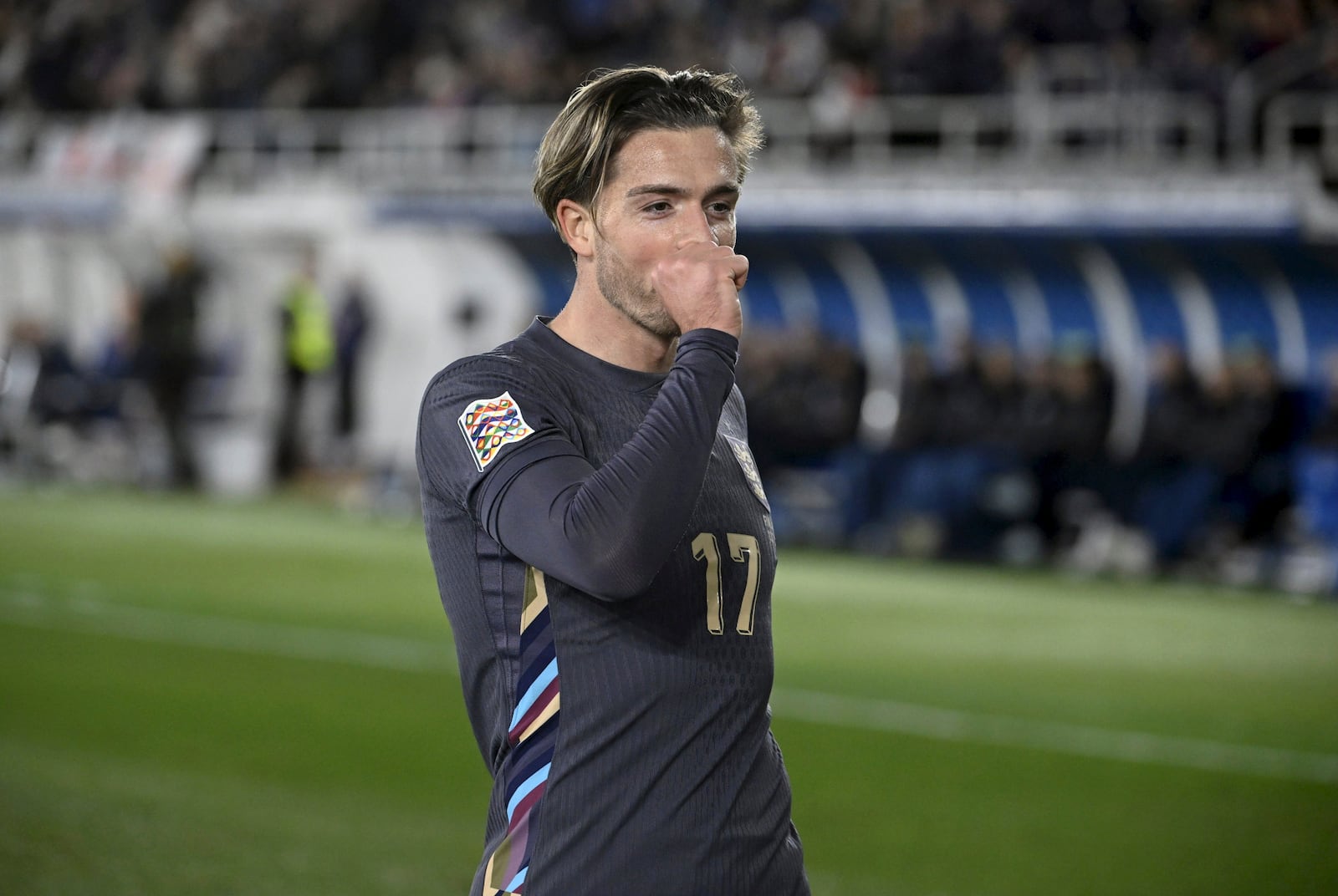 Jack Grealish of England celebrates after scoring the opening goal during the UEFA Nations League soccer match between Finland and England, at the Olympic Stadium in Helsinki, Finland, Sunday, Oct. 13, 2024. (Antti Aimo-Koivisto/Lehtikuva via AP)