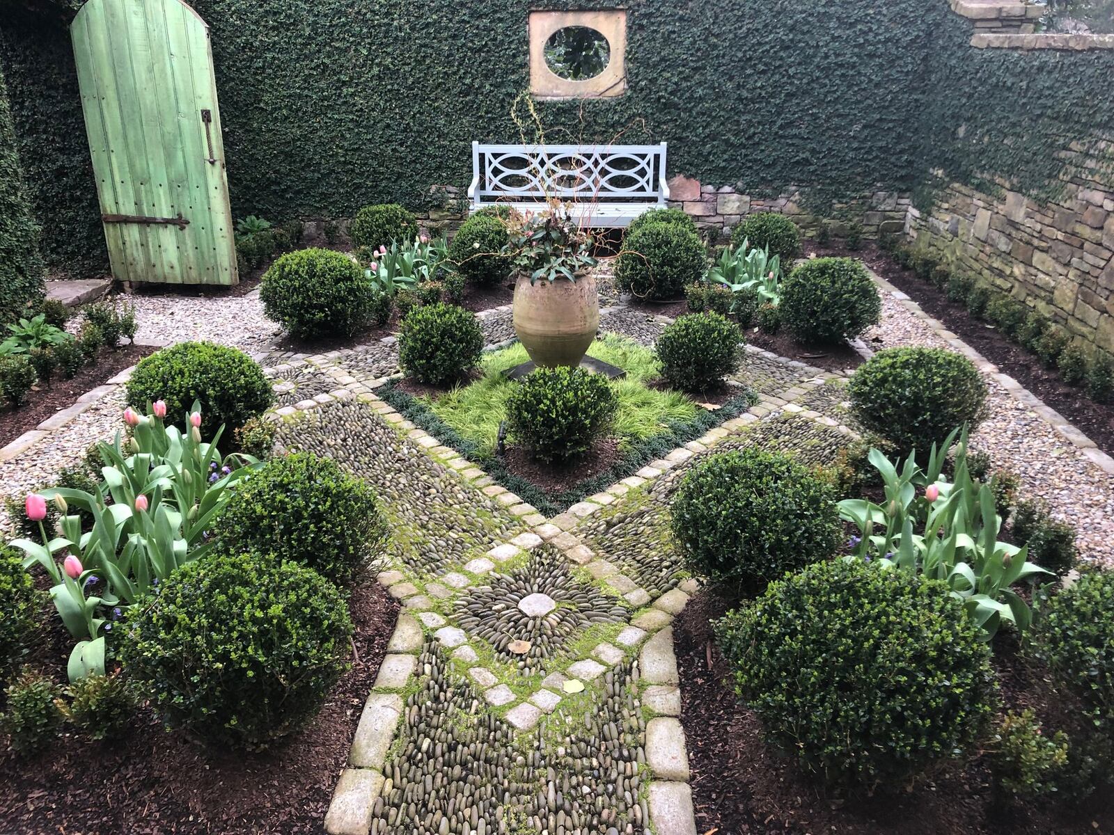 Andrea and Mark Kauffman’s French provincial garden will be part of the 2019 Gardens for Connoisseurs Tour. Contributed