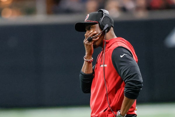 Falcons head coach Raheem Morris reacts after Atlanta Falcons quarterback Kirk Cousins (18) throws an interception during the second half of an NFL football game against the Los Angeles Chargers on Sunday, December 1, 2024, at Mercedes-Benz Stadium in Atlanta. 
(Miguel Martinez/ AJC)