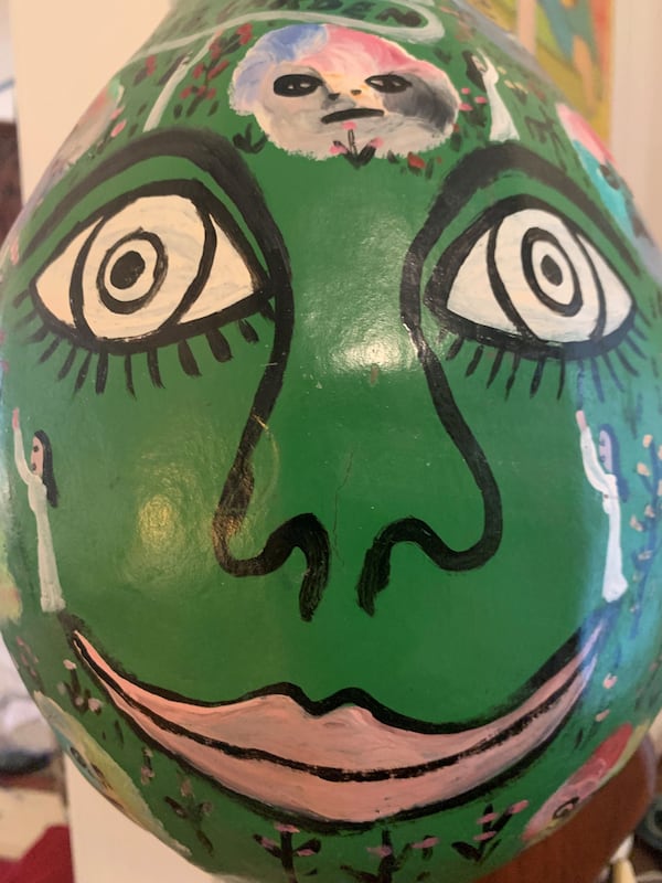 Detail from a large gourd that Howard Finster grew and painted in Paradise Garden, his 4-acre folk art environment/roadside attraction that continues to operate in the Northwest Georgia town of Summerville.
(Courtesy of Howard Pousner)