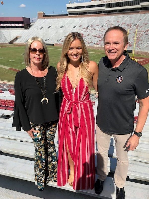 Margaret Binkley, left, Maura Binkley and Jeff Binkley of Dunwoody in a photo supplied by the Binkley family. Maura’s parents have started Maura’s Voice, a research foundation in her honor. SPECIAL