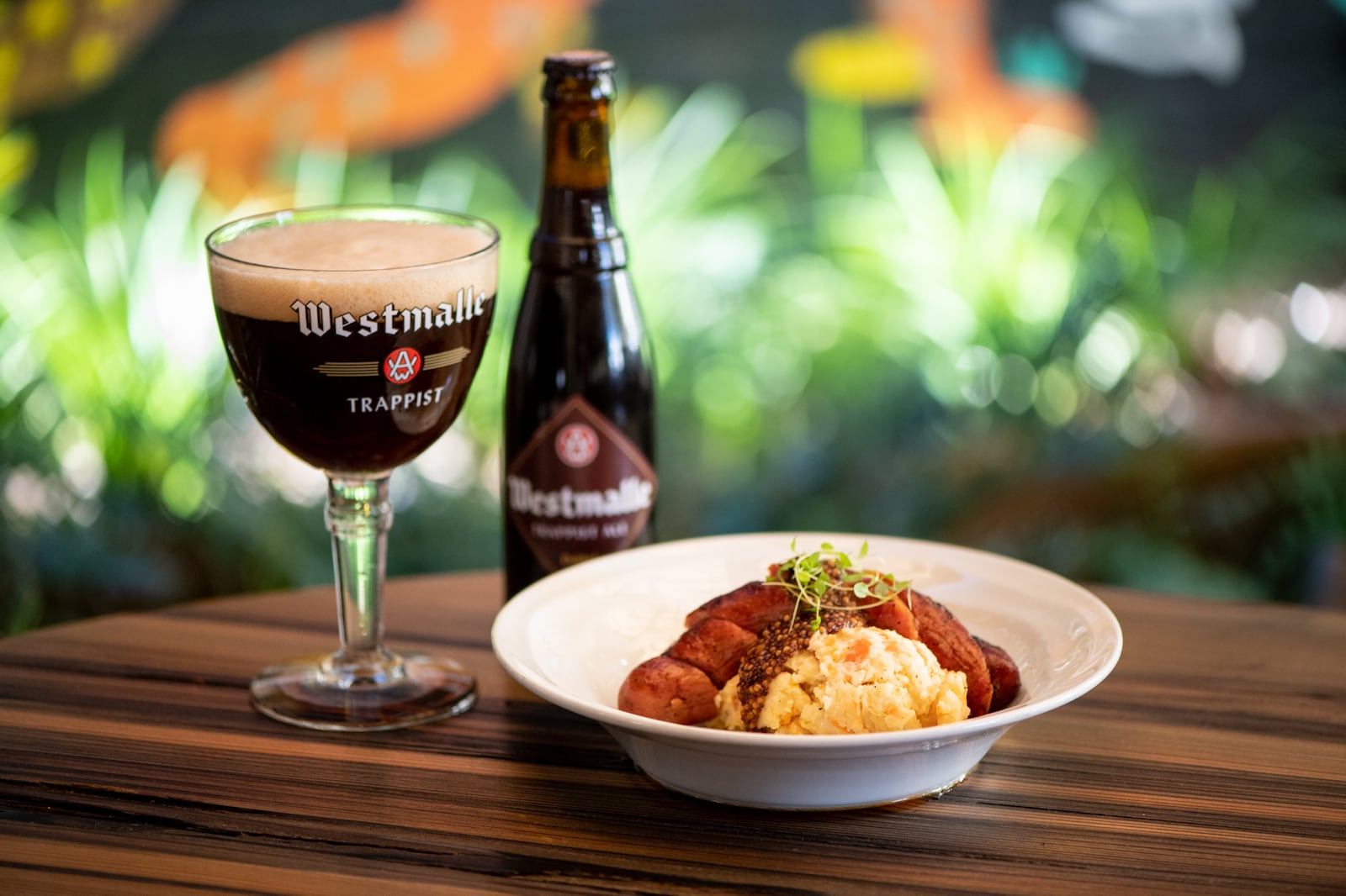 Brick Store Pub Sausage Root Vegetable Mash with pickled mustard seeds paired with Westmalle Trappist Ale. (Mia Yakel for The Atlanta Journal-Constitution)