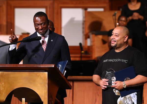 Yusef Salaam and Raymond Santana, two of the Central Park Five, are recognized during a program at Ebenezer Baptist Church on ending mass incarceration. CURTIS COMPTON / CCOMPTON@AJC.COM