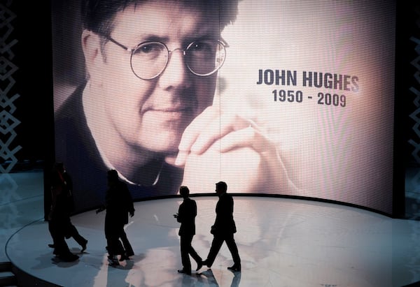 Stars of John Hughes films leave the stage after a tribute to the late director at the 82nd Academy Awards in 2010. (AP Photo/Mark J. Terrill)