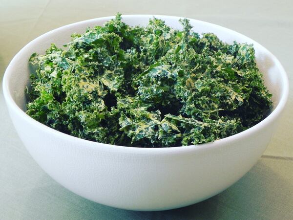 Val’s Kale Chips start with individual leaves of curly kale, stems removed, which then are massaged with a spice mix that uses ground cashews as a base. CONTRIBUTED BY BRANDON ROBINSON