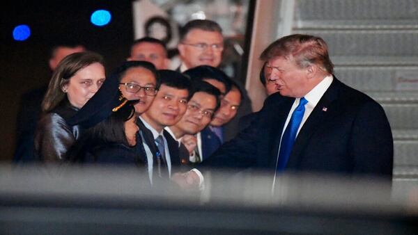 President Donald Trump is greeted after arriving on Air Force One at Noi Bai International Airport, in Hanoi, Vietnam, Tuesday, Feb. 26, 2019, ahead of his second summit with North Korea's Kim Jong Un, scheduled for Wednesday. 