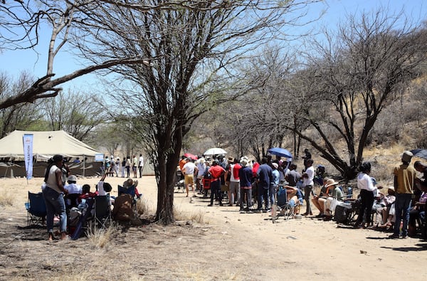 Namibians queue to cast their votes in presidential elections in Windhoek, Namibia, Wednesday, Nov. 27, 2024. (AP Photo/Dirk Heinrich)