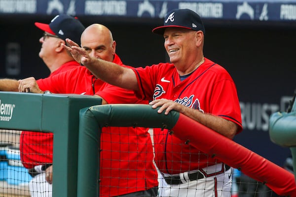 Atlanta Braves manager Brian Snitker gestures before the team's baseball game against the Arizona Diamondbacks, Friday, July 29, 2022, in Atlanta. (AP Photo/Brett Davis)