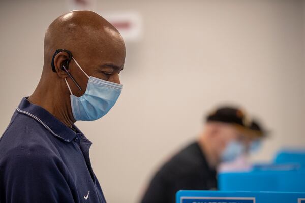 Charles McClendon of Snellville votes in May at the Gwinnett County Voter Registration and Elections Office in Lawrenceville.  As the number of Black, Asian-American and Hispanic residents has grown in Gwinnett County, the white population dropped to nearly 54% in 2019 census estimates. (ALYSSA POINTER / ALYSSA.POINTER@AJC.COM)