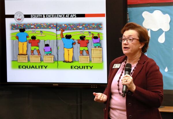 Atlanta school board member Cynthia Briscoe Brown speaks about the district's proposed equity policy  during a community meeting at Hope-Hill Elementary School on Feb. 25. Curtis Compton/ccompton@ajc.com