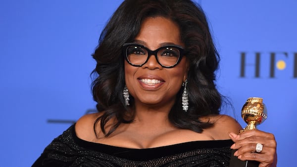 In this Jan. 7, 2018, file photo, Oprah Winfrey poses in the press room with the Cecil B. DeMille Award at the 75th annual Golden Globe Awards in Beverly Hills, Calif. Winfrey has visited the grave of a black Alabama woman whose rape by six white men in 1944 drew national attention and whose story was highlighted in Winfrey's recent Golden Globes speech. Winfrey said in an Instagram post that on assignment for "60 Minutes," she ended up in the town of Abbeville, Ala., where Recy Taylor suffered injustice, endured and recently died. (Photo by Jordan Strauss/Invision/AP, File)