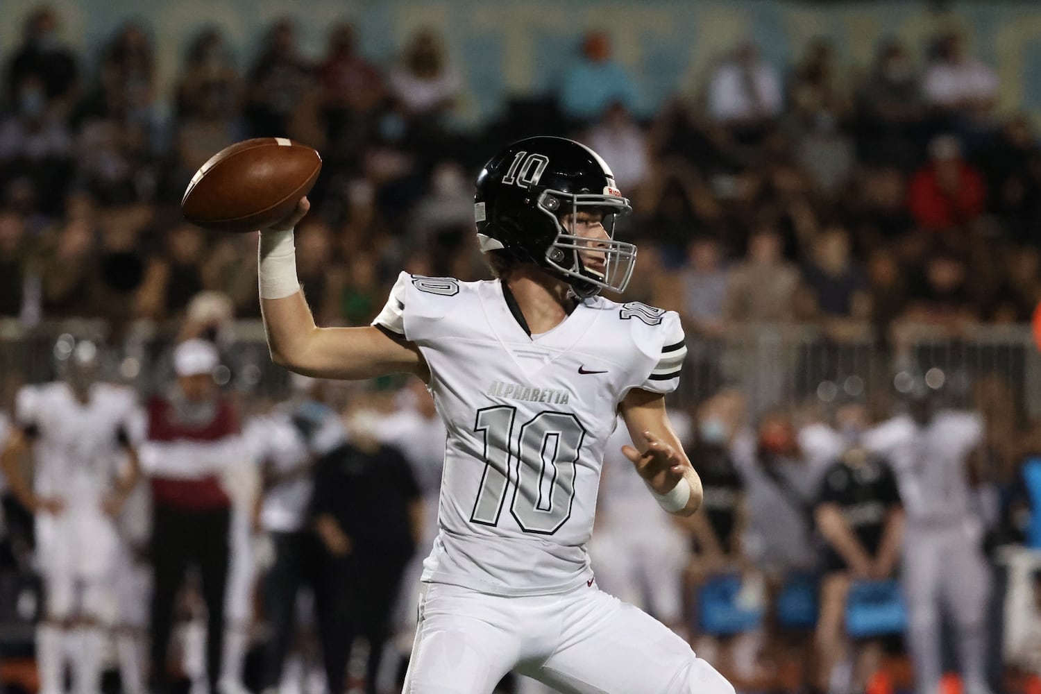 Sept. 25, 2020 - Johns Creek, Ga: Alpharetta quarterback Ben Guthrie (10) attempts a pass against Chattahoochee in the first half at Chattahoochee high school Friday, September 25, 2020 in Johns Creek, Ga.. JASON GETZ FOR THE ATLANTA JOURNAL-CONSTITUTION