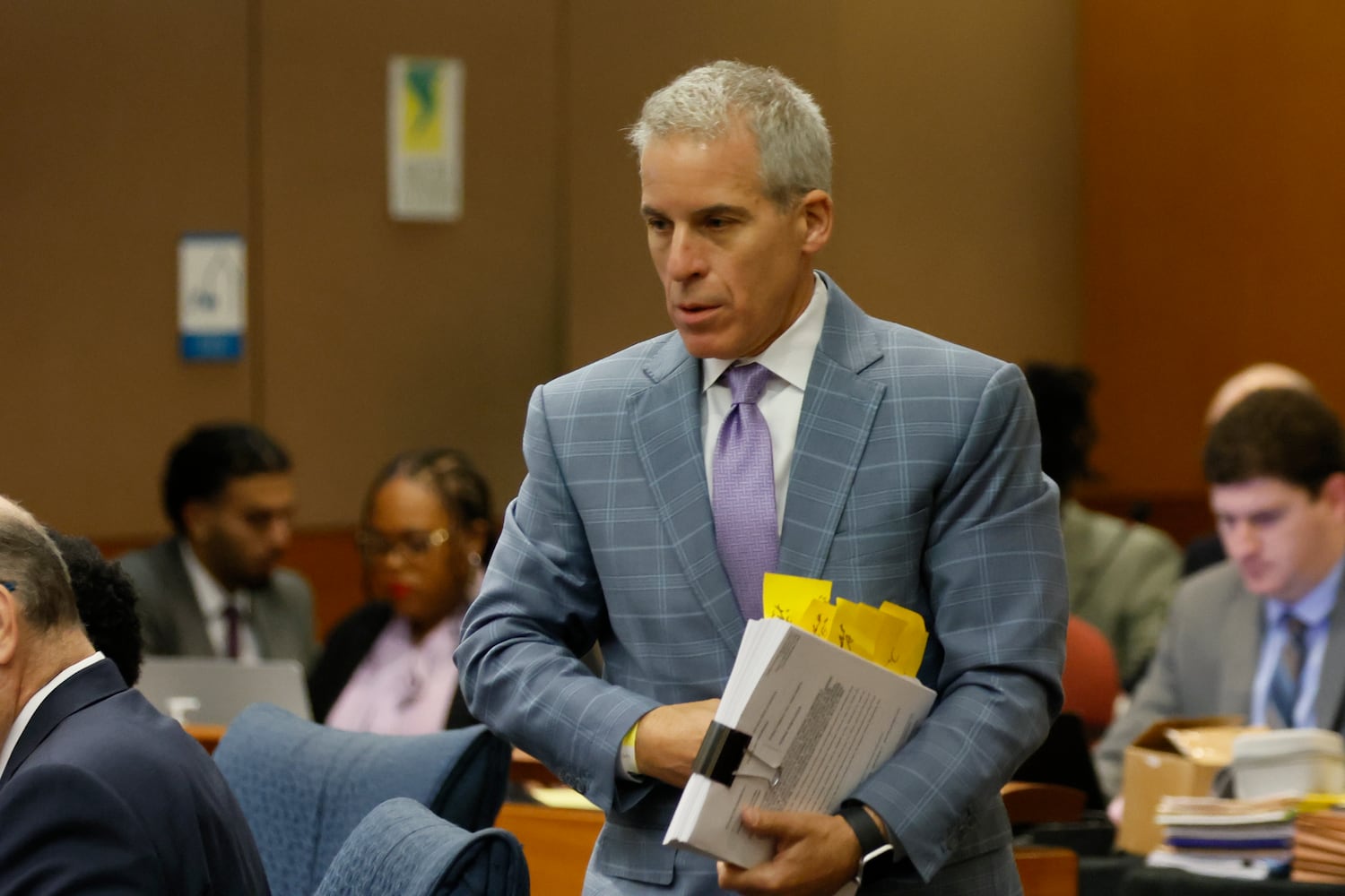 Atlanta rapper Young Thug’s defense attorney, Brian Steel, carries documents as he walks toward the stand during a motion hearing at the Fulton County Courtroom on Tuesday, July 30, 2024.
(Miguel Martinez / AJC)