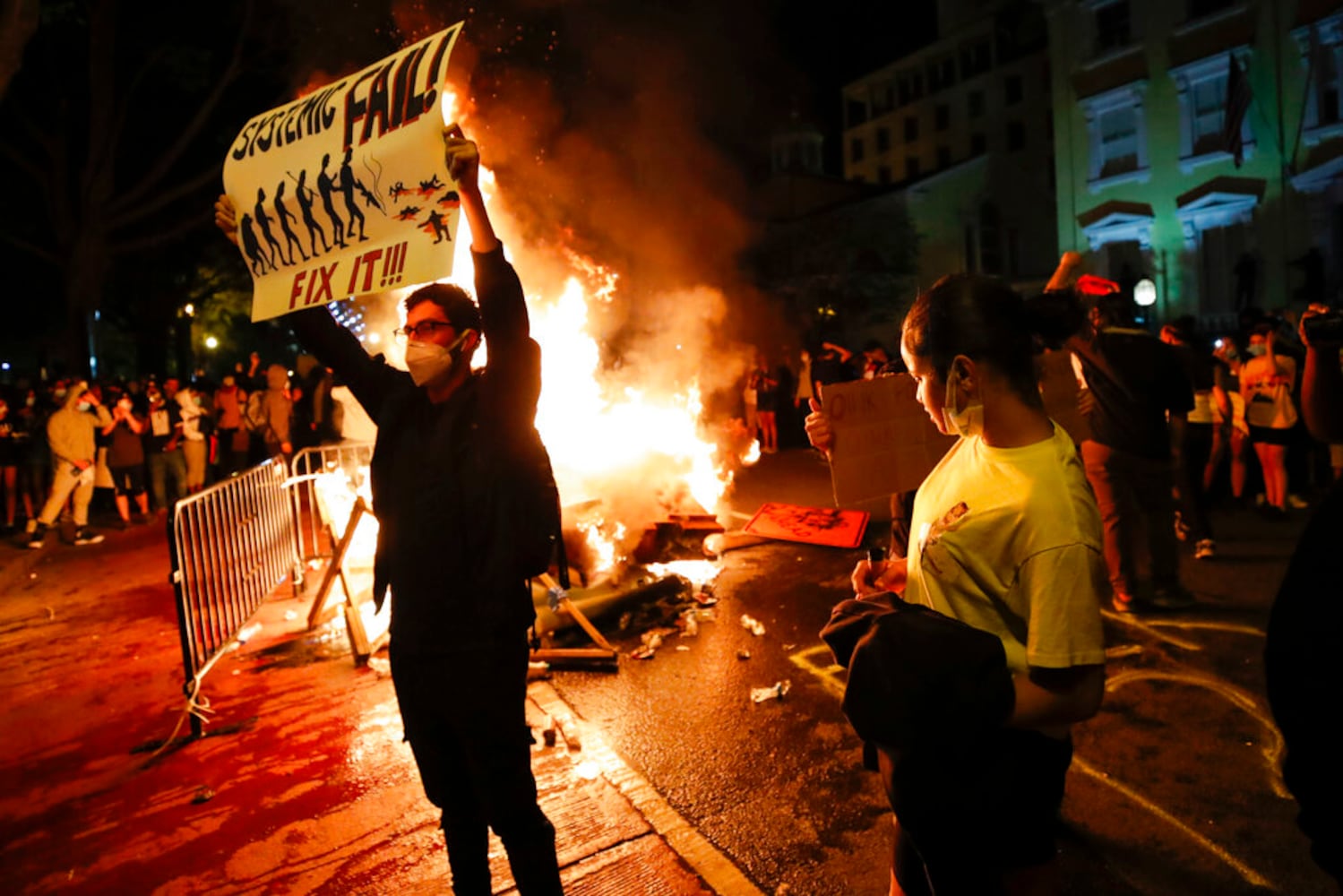 PHOTOS: U.S. cities face protests, fallout Sunday after George Floyd’s death