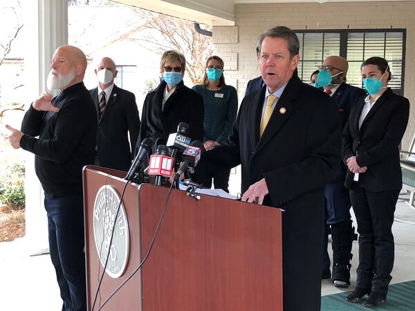 Georgia Gov. Brian Kemp speaks during a news conference last week after the first coronavirus vaccinations were administered to nursing home personnel.