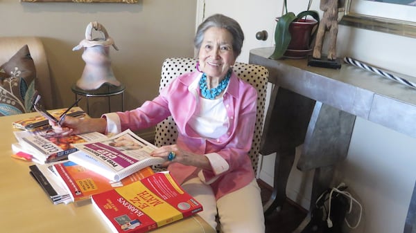 Joyce Lowenstein showed all the math books she’s working through in preparation for taking a college mathematics test.  The Atlanta resident graduated Thursday from Georgia State University with a bachelor’s degree in art history. 