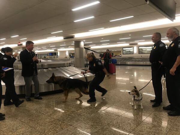 Blesk and his handler, CBP officer Becky Shuford.