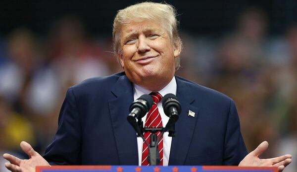 Then-Republican presidential candidate Donald Trump speaks during a campaign rally at the American Airlines Center on September 14, 2015 in Dallas, Texas. 