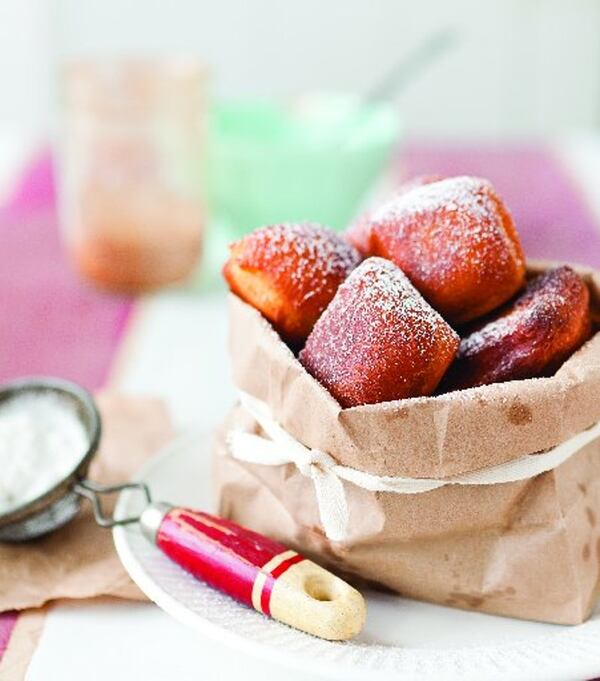 Apple cider doughnuts capture the essence of fall, as shown in the book "Apples,” by Amy Pennington. 