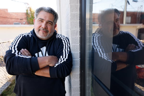 Long-time Dalton resident Zeucis Martinez poses outside of his office on Wednesday, October 19, 2022. Martinez is also a Republican and part of the electorate that supported President Donald Trump's 2020 reelection bid by a 40-point margin in Whitfield County, where Dalton sits. Miguel Martinez / miguel.martinezjimenez@ajc.com