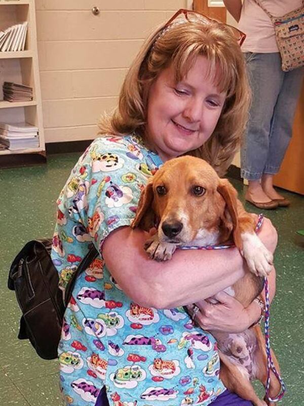 Murray with his foster mom Claudette Towe.