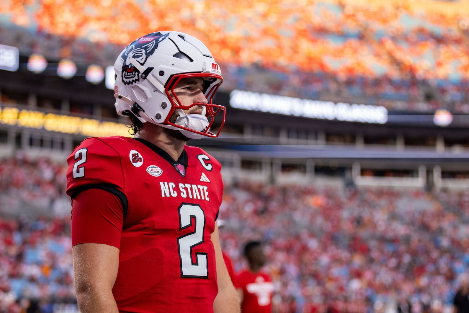 FILE - North Carolina State quarterback Grayson McCall (2) during the pre game warm up of an NCAA college football game, Sept. 8, 2024, in Charlotte, N.C. (AP Photo/Scott Kinser, File)