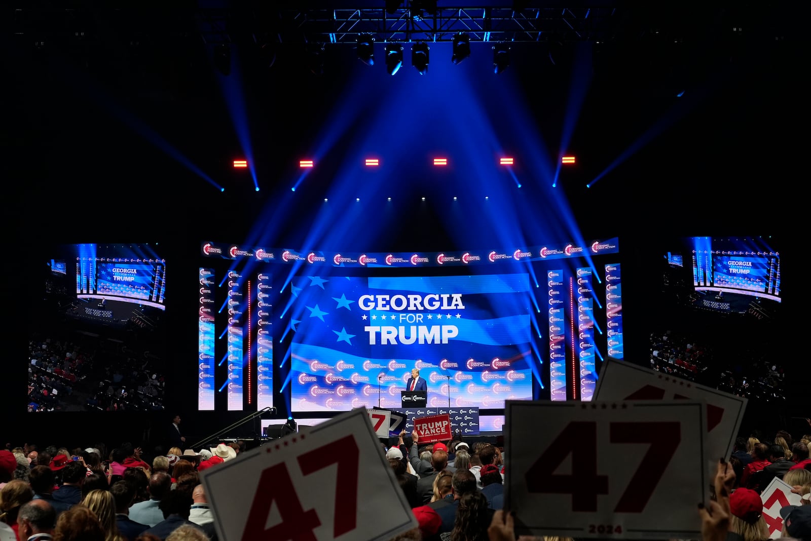 Republican presidential nominee former President Donald Trump speaks at a Turning Point Action campaign rally, Wednesday, Oct. 23, 2024, in Duluth, Ga. (AP Photo/Alex Brandon)